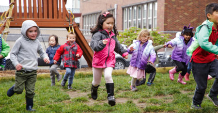 Image of children playing outside at Listen and Talk.